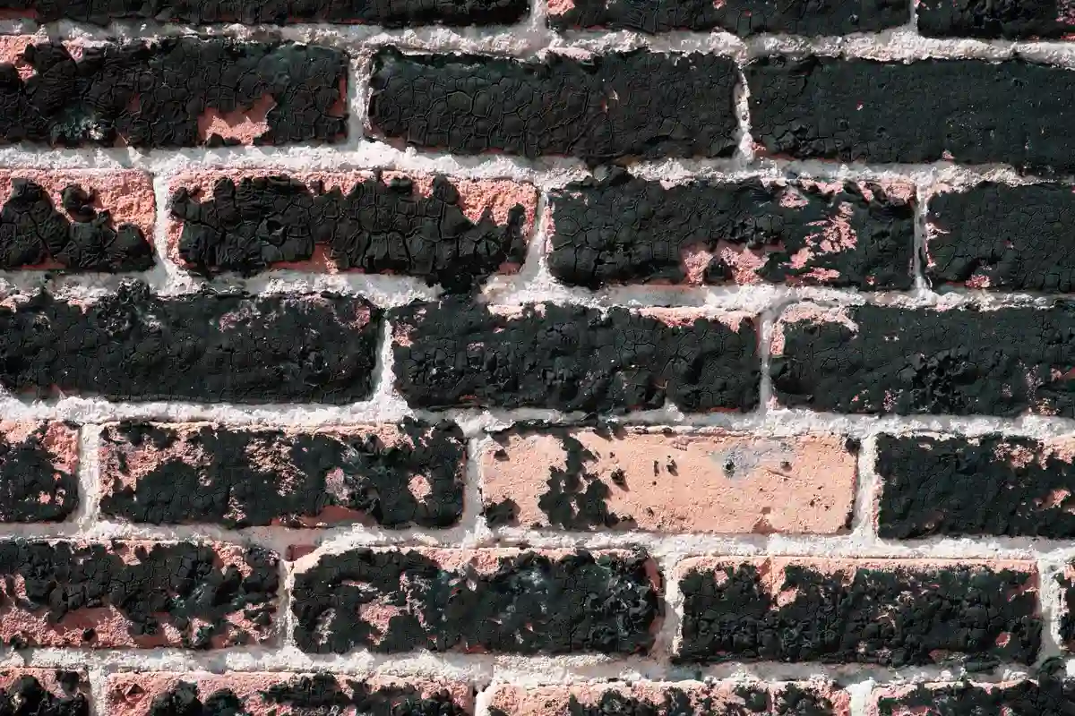 Before: Side elevation — complete brick installation with proper wall tie placement