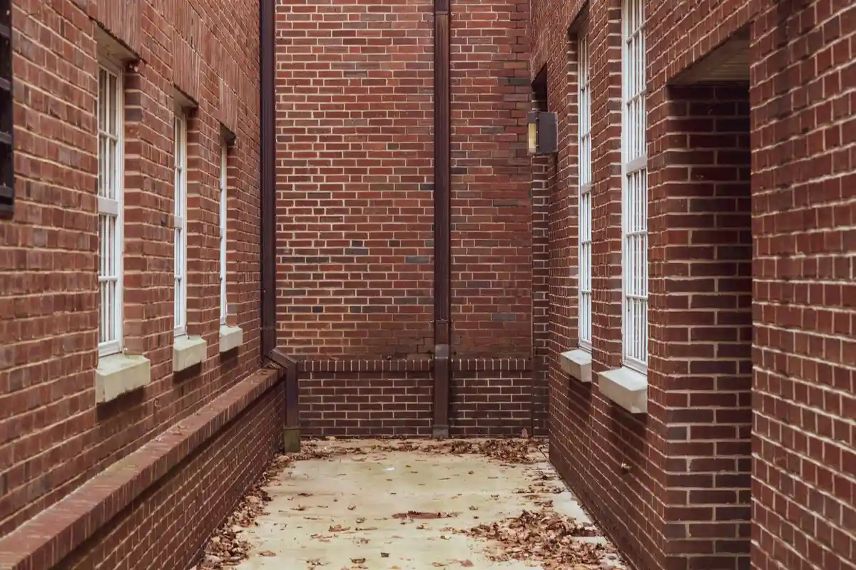 After: Entry wall — mortar-matched joints with consistent tooling profile throughout