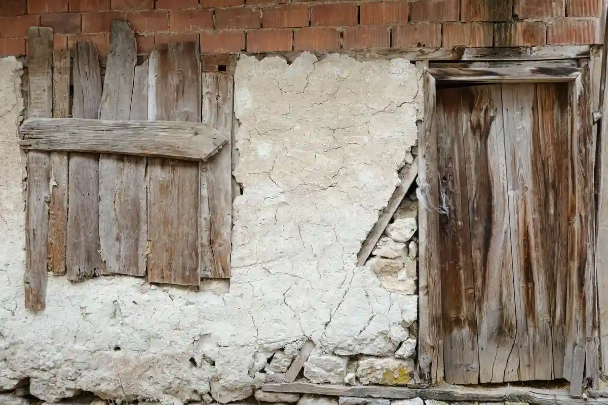 Before: Entry wall — mortar-matched joints with consistent tooling profile throughout