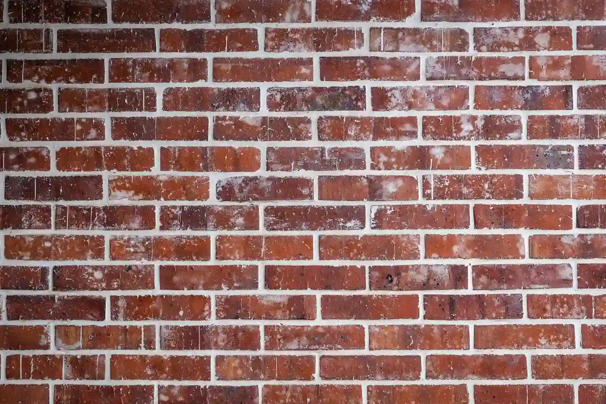 After: Chimney section — deteriorated mortar repointed and sealed against water infiltration
