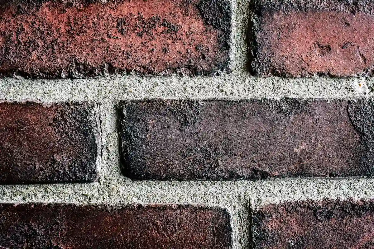 After: Side wall — full-depth joint restoration with consistent tooled profile