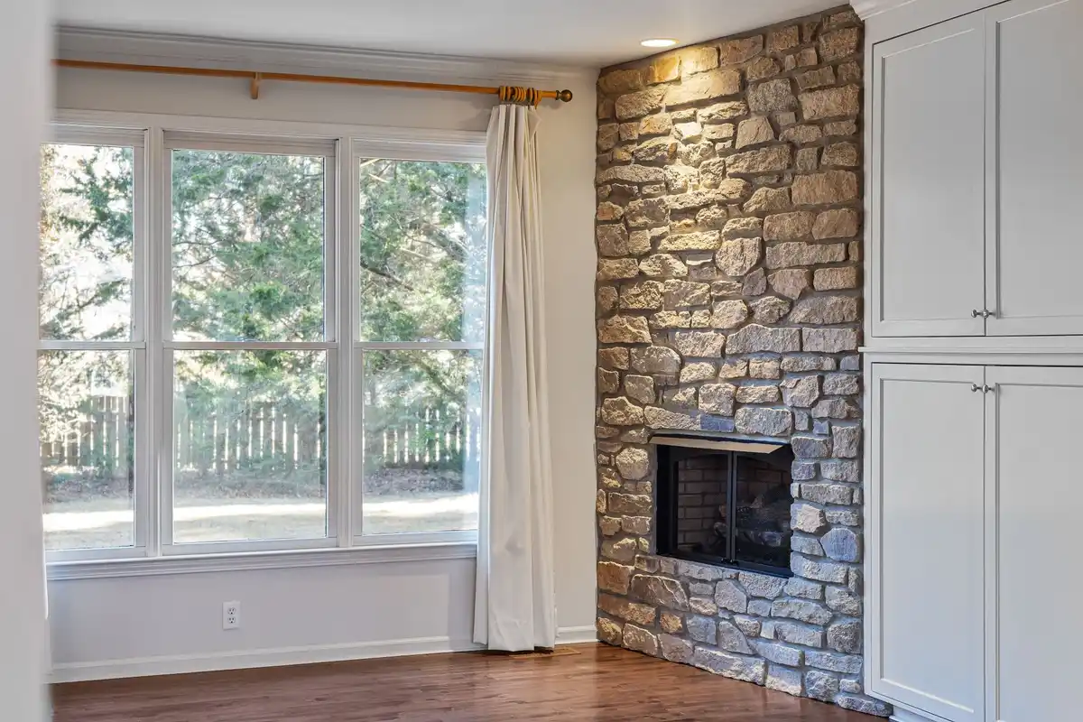 After: Facade accent — limestone sills and lintels installed with proper sealant at all joints