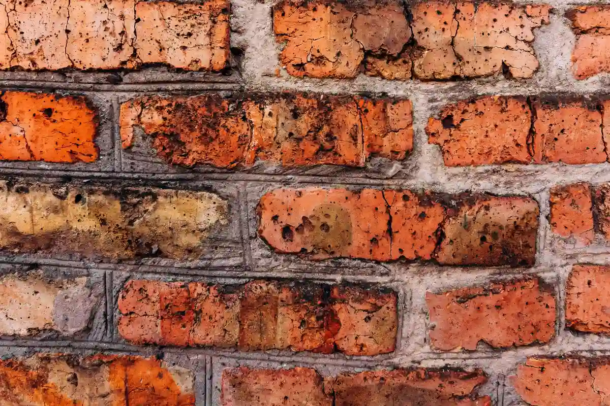 After: Main facade — failed mortar joints removed and replaced with Type S color-matched mortar