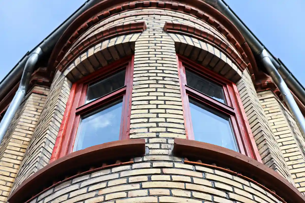 After: Corner and parapet — parapet cap replaced and flashing integrated correctly