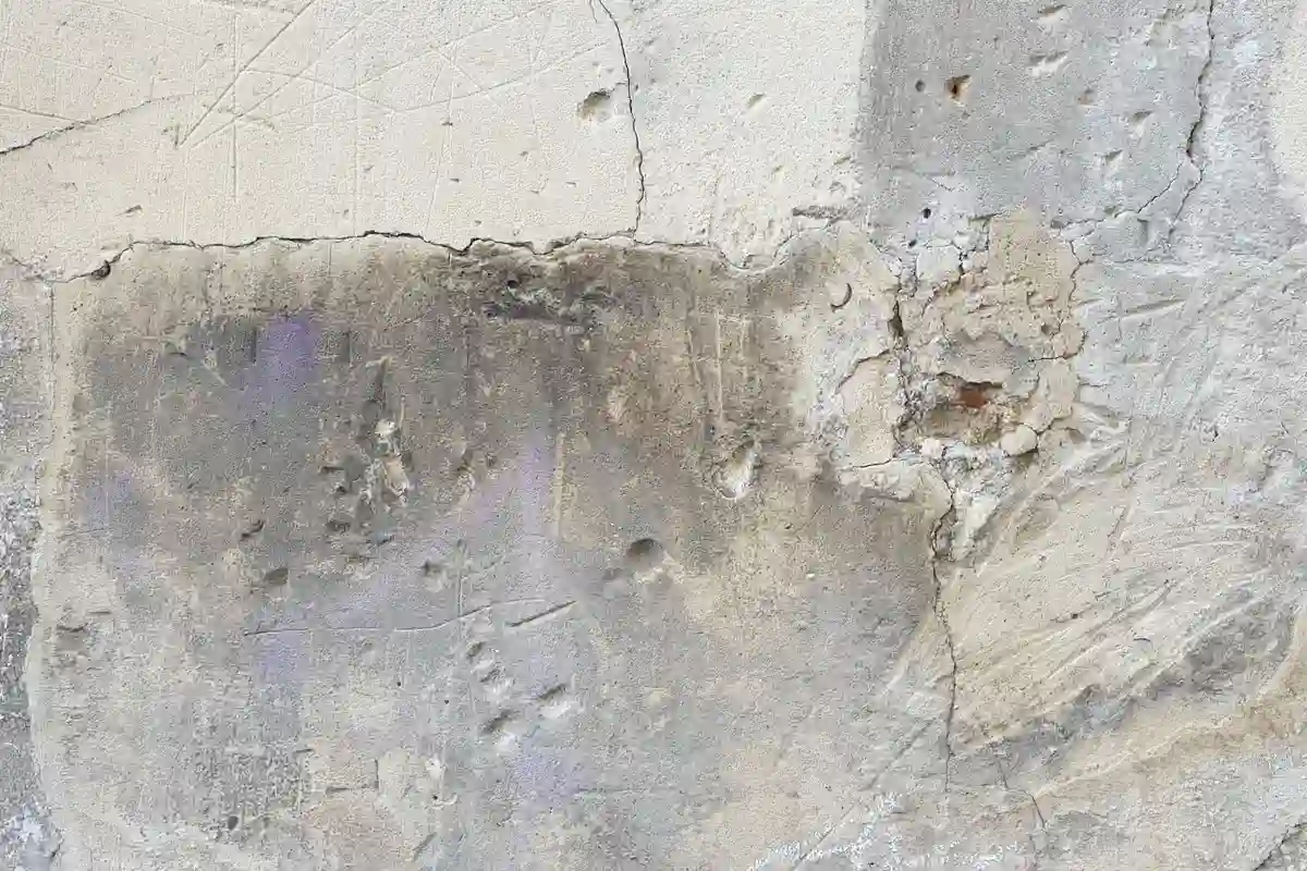 Before: Front facade — deteriorated brick replaced with color-matched full-bed clay brick