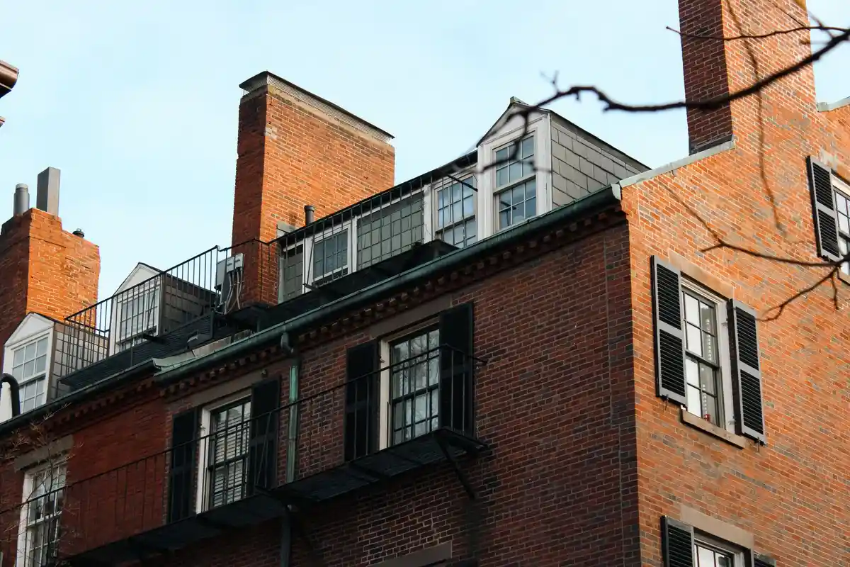 Before: Base detail — new brick courses set plumb and level with correct mortar joint spacing