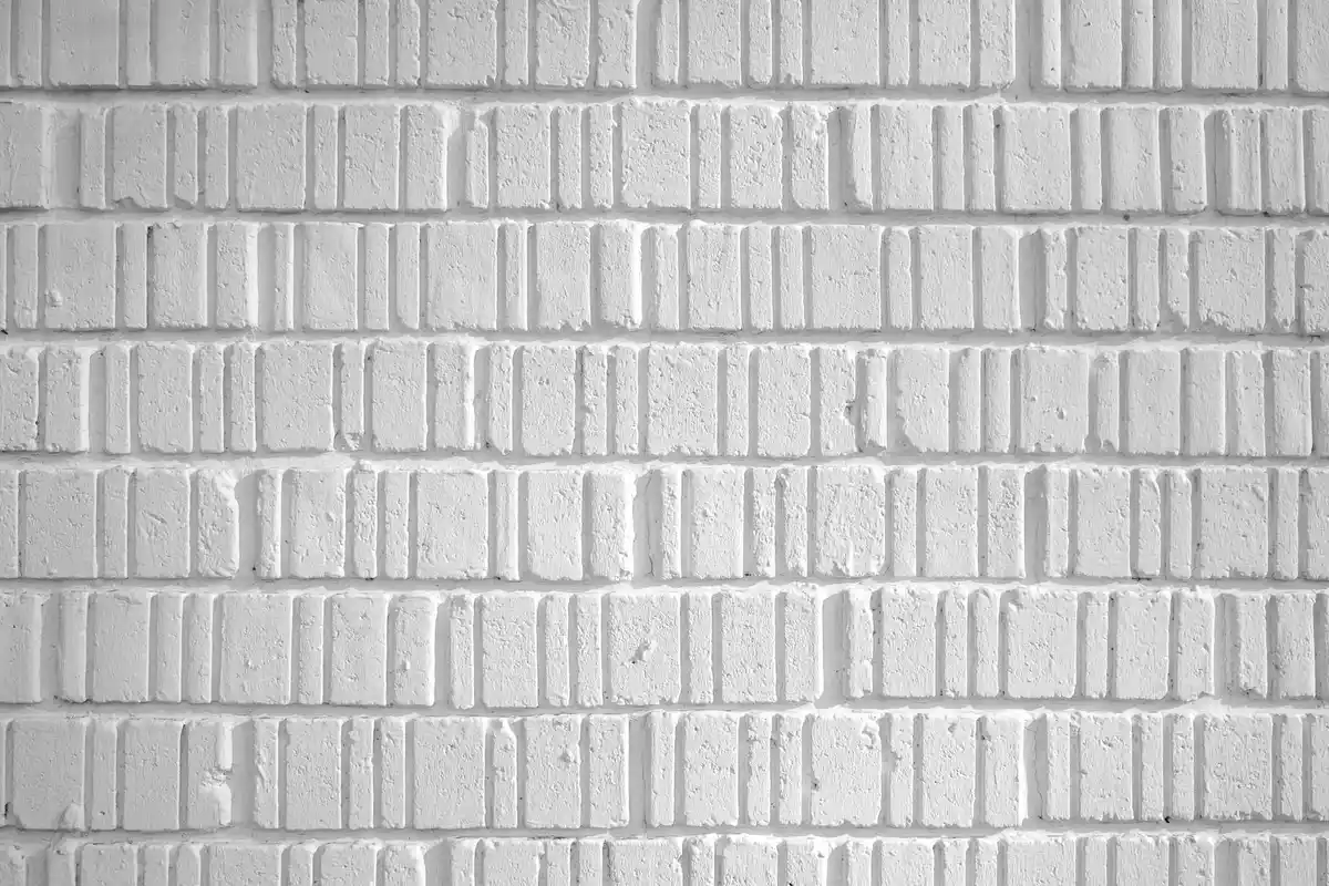 After: Corner detail — damaged corner brick replaced and repointed with color-matched mortar