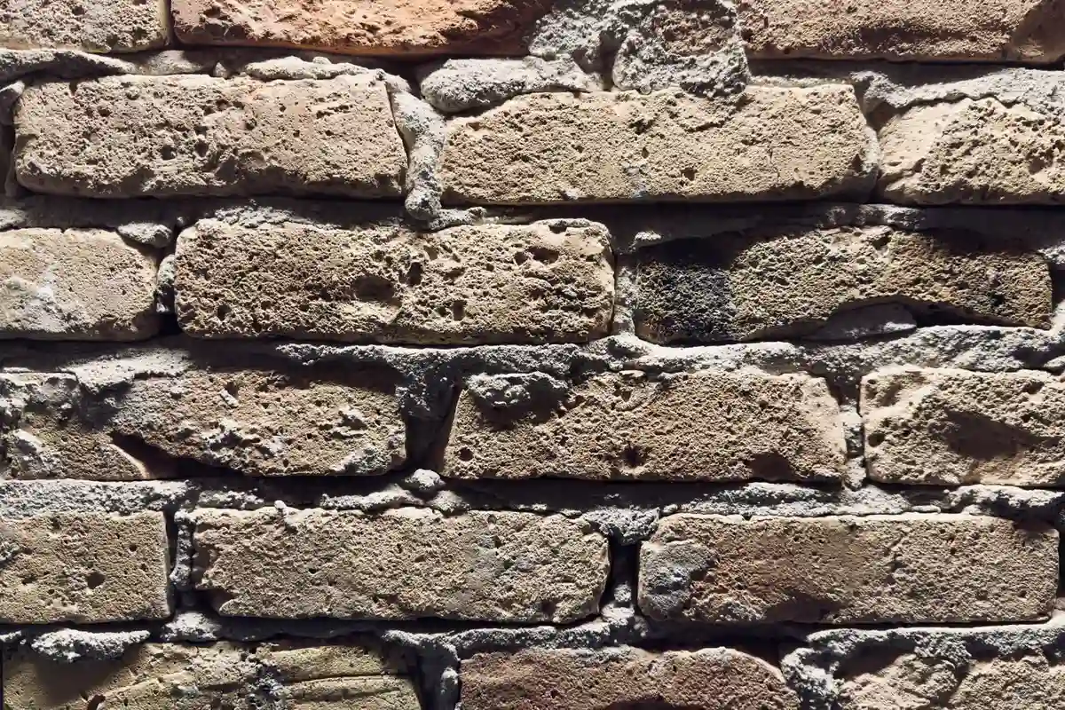 Before: Window surrounds — limestone sills and lintels installed flush with consistent mortar profile