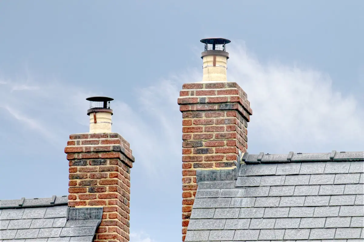 Before: Base detail — new brick courses set plumb and level with correct mortar joint spacing