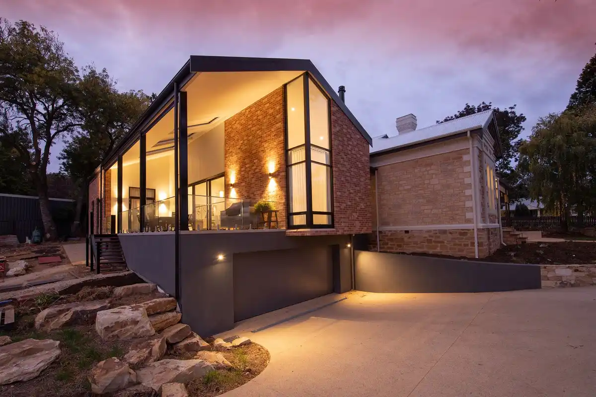 After: Side elevation — complete brick installation with proper wall tie placement
