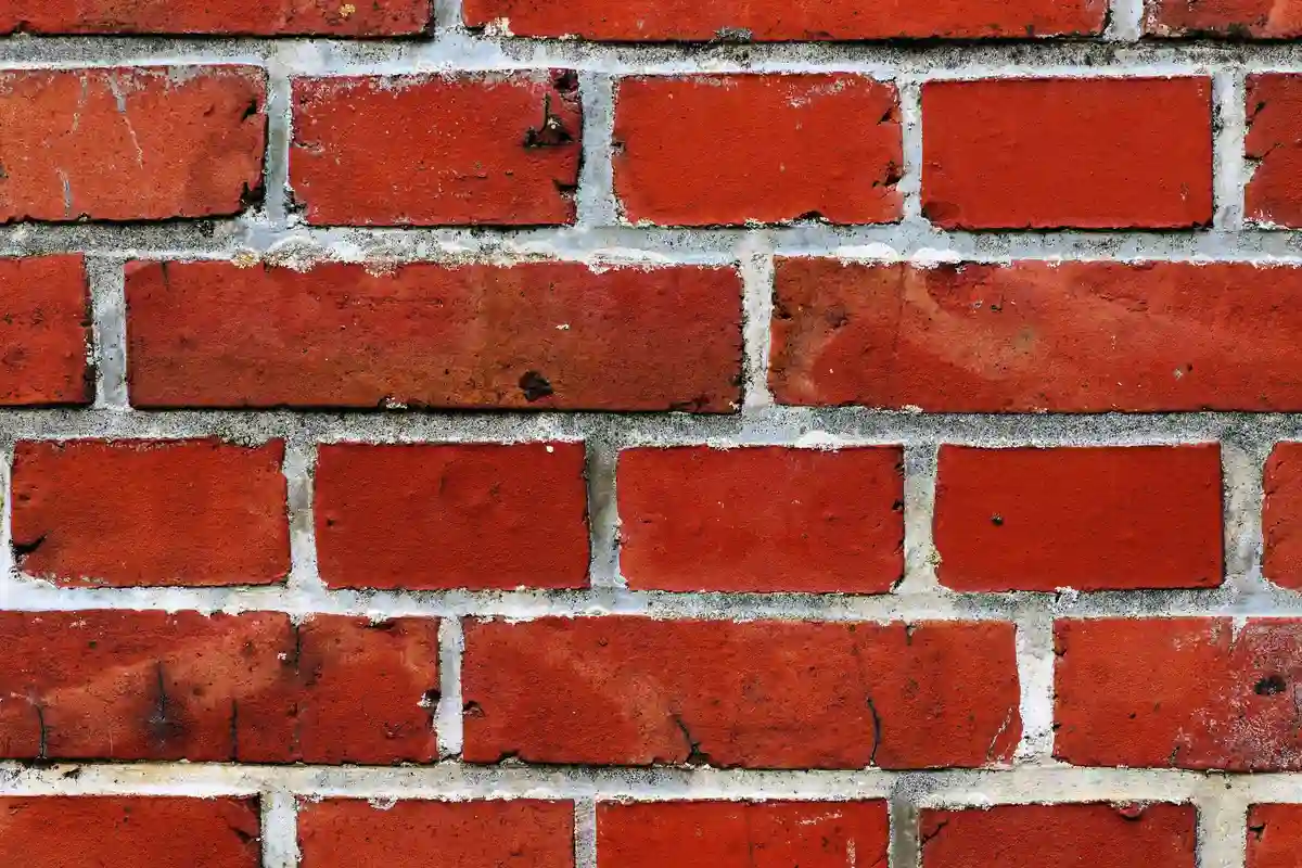 After: Entry wall — mortar-matched joints with consistent tooling profile throughout
